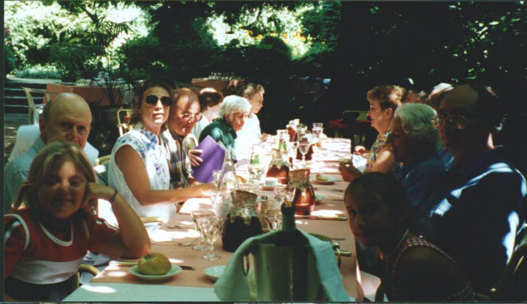 Small group eating gourmet food during tour of Dordgne, France.