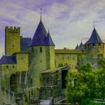 Sunrise lighting the first of 52 towers of the walled city of Carcassonne adjoining our hotel